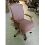 DUCAL Solid Pine ladies swivel chair, castors, tilt tension control. Fabric showing signs of wear.