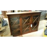 Glazed mahogany bookcase, key present, lovely condition. 144 cm long, 100cm high, 29cm deep. NOTE