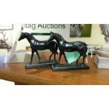 Pair of composite horse figures
