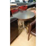 *Dark brown circular bistro table, pedestal chromed legs, for two people. Outdoor or indoor use.