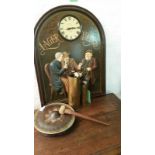 2 brass shell casings together with a dinner gong and decorative 'beer' clock.