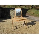 Pine dressing table with galleried back, drawer, and turned legs, plus large mirror atop.