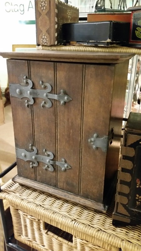 Free standing oriental wooden cabinet together with a further earlier