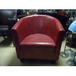 *Tub chair, faux red leather 68cm wide, 75 cm high, 51 cm seat depth. As found. *This lot will