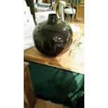 Large black globular ceramic vase, marked for John lewis to base, approx 35 cm high, 30cm wide