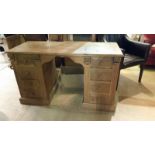 Solid pine pedestal style desk. Decorative scroll details to underside with 4 drawers at either end.