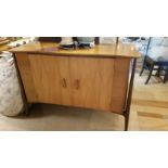 Mid-century sideboard by Maple furniture. Decorative inlay detail to doors. Bears makers label