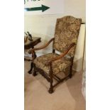 A very good carved high backed armchair, in Italian style with acanthus detail to arms. Turned