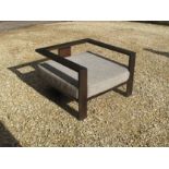 Modernist wood framed armchair.