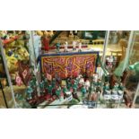 Superb collection of Oriental miniature figures. Each figure with metal stands to feet, dressed in