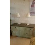 Pair of table lamps, tall metal stands with trimmed cream shades. PAT tested. Approx 66 cm overall