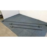 Three hand forged iron curtain poles, measuring approx 313 cm, 209 cm, 186 cm