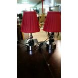 Two small table lamps, PAT tested, silvered bases, red shades