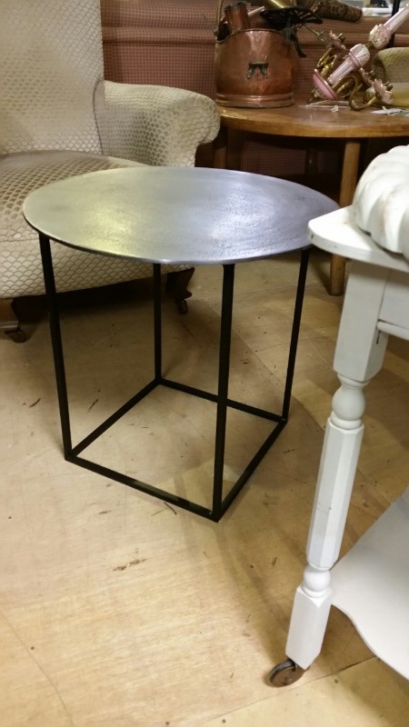 Terence Conran Content range: circular side table in bronze alumnium with iron cubic base. Approx 50