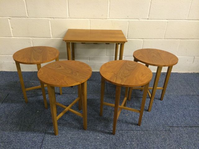 Very nice mid 20th century teak retro tables set..with 4 small circular tables stored under the main - Image 5 of 11