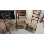 Collection of 3 late 19th, early 20th Century ladder back chairs, each with rush seats.