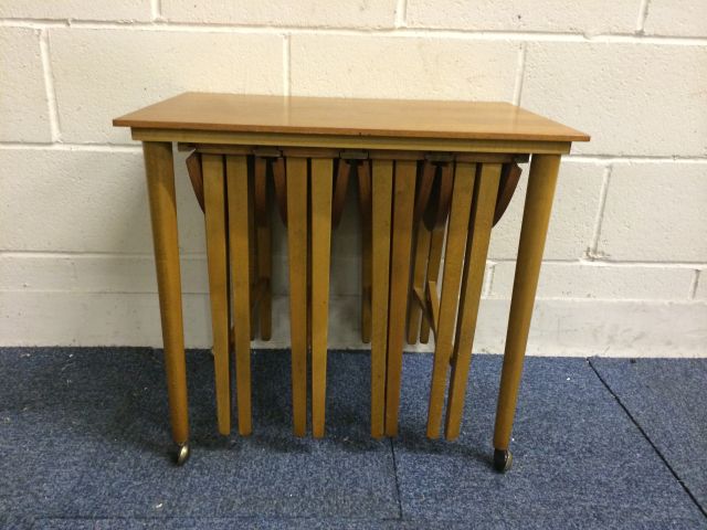 Very nice mid 20th century teak retro tables set..with 4 small circular tables stored under the main - Image 3 of 11