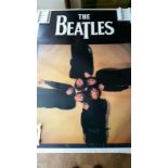 The Beatles poster measuring 64 x 89 cm. Some edge marking and scuffs/creasing. Generally good. This