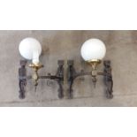 Pair of early 20th Century wall lights. Decorative iron frames