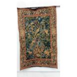 Decorative tapestry style wall hanging. Images of Peacocks and foliage.