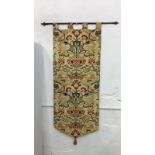 Decorative tapestry style, lined wall hanging together with hand forged iron pole.