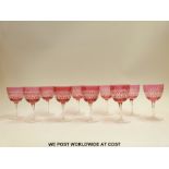 A set of ten flash overlaid cranberry glasses with geometric decoration,