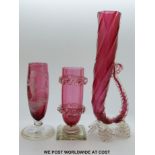 Two Victorian cranberry glasses including a Mary Gregory piece and a vase