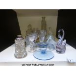 A quantity of cut and pressed clear glass including penny licks etc and silver-topped examples and