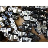 A box of SLR cameras including Pentax,