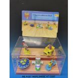 A Shell display stand of '5 toys to collect' including figures and advertising poster