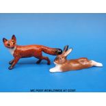 A small Beswick fox together with a small Royal Doulton hare