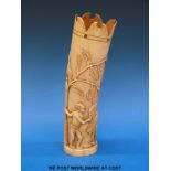 An African ivory tusk vase carved with hunt scene,