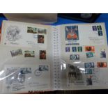 A large quantity of GB first day covers in four albums,