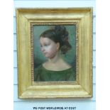 An early 19thC continental school oil on canvas of a young girl, label verso,