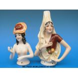 Two Art Deco ceramic half dolls in the form of a lady in an elaborate headdress the other of a nude