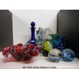 A collection of Mdina and other glassware to include vases, paperweights,