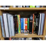 A collection of books celebrating The Beatles and their achievements over the years.