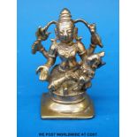 A 19th century Indian bronze figure of a multi armed deity (7cm tall)