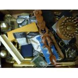 A quantity of collectables to include horse brasses, shell and bullet displays, coin sets,