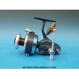 A Mitchell 410A fixed spool fishing reel in soft case with two spare spools, appears unused.