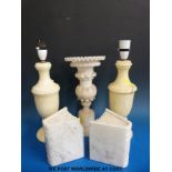 An alabaster carved trumpet vase, a pair of 'book' book ends, lamps etc.