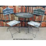 Two folding vintage 'Diary Fresh' chairs and galleried table