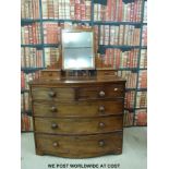 A 19thC mahogany bow fronted dressing chest of two over three graduated drawers (W103 x D52 x