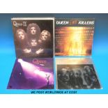 Thirteen LPs by Queen,