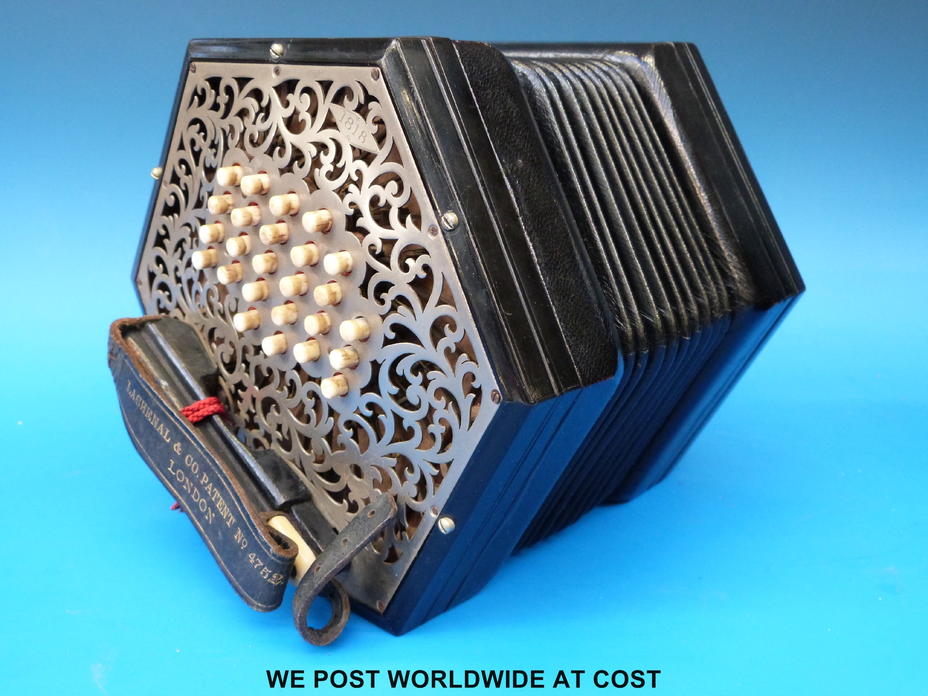 A c1900 MacCann Duet concertina by Lachenal & Co with 56 bone buttons,