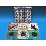 A collection of seven records by The Beatles,