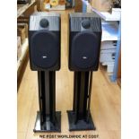 A pair of B & W (Bower & Wilkins) CDM1 120 watt special edition speakers and stands.