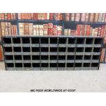 A metal military or similar style cubby hole unit (W130 x D23 x H44cm)