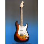 An autographed Rolling Stones guitar, signed on the body by Mick Jagger, Keith Richards,