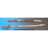 An 1827 pattern naval officer's sword with inscription to locket and quill point blade.